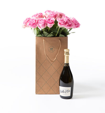 Rosa roser i gavepose med bobler  Rosa roser i gavepose med bobler